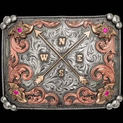A custom square women's belt buckle featuring a compass rose figure 